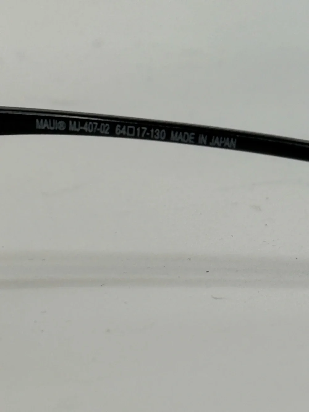 Mimi Jim MJ-407-02 64 17 130 Ho’okipa Rimless Sunglasses lightweight wrap